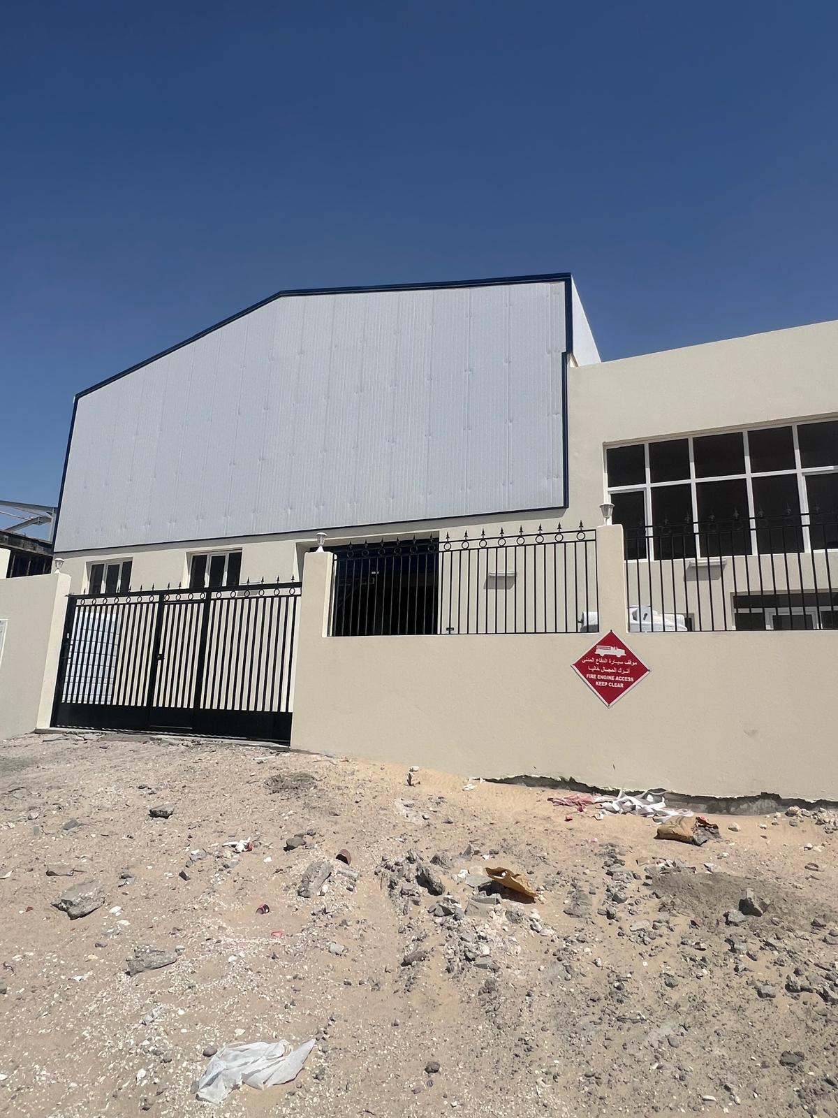 Warehouse facade and gated entrance