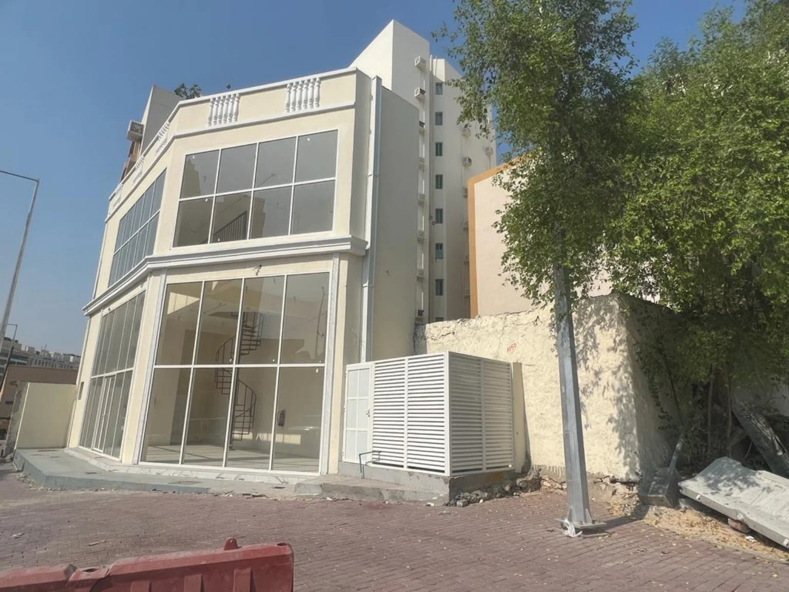Commercial building exterior with large glass sections